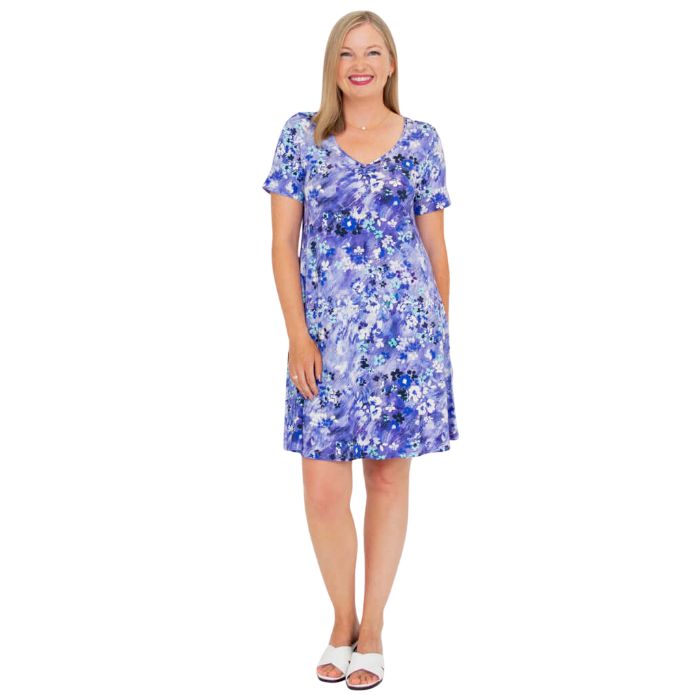woman wearing creative print lanai dress front view set on a white background