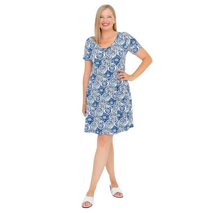 woman wearing zesty print lanai dress front view set on a white background