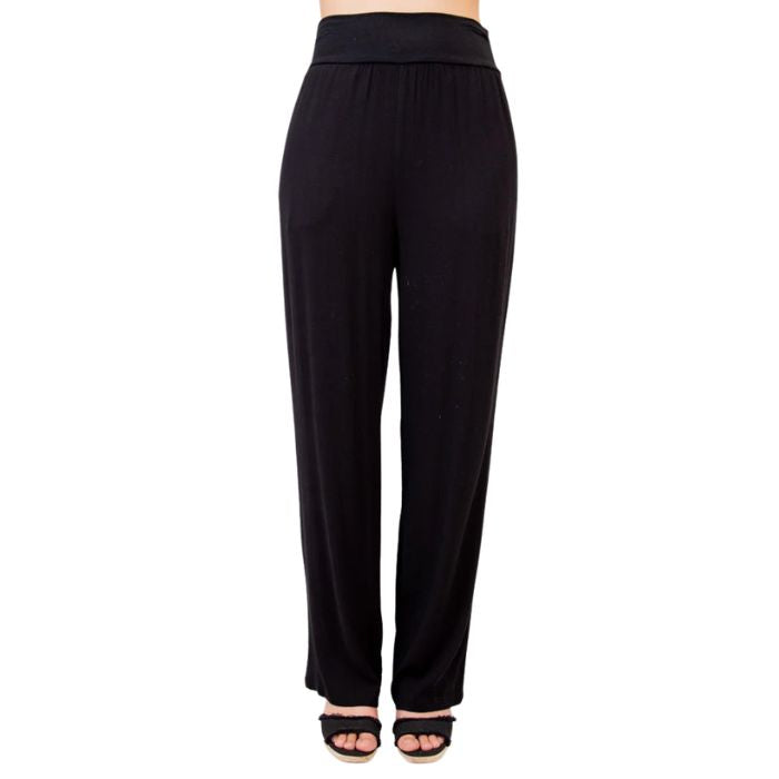 female model wearing black landon pants front view on white background
