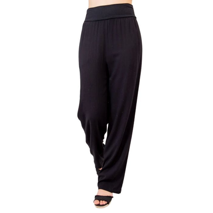 female model wearing black landon pants front view on white background