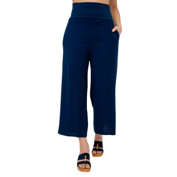 female model wearing indigo blue landon capri pants front view on white background