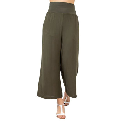female model wearing khaki green landon capri pants front view on white background