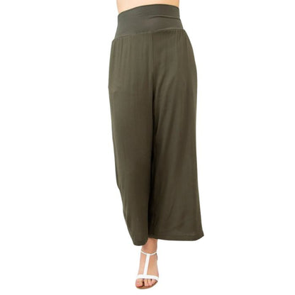 female model wearing khaki green landon capri pants front view on white background