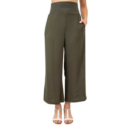 female model wearing khaki green landon capri pants front view on white background