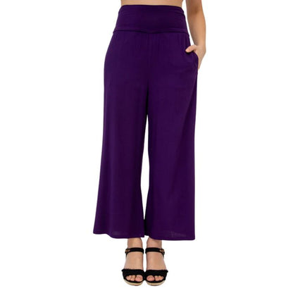 female model wearing royale purple landon capri pants front view on white background
