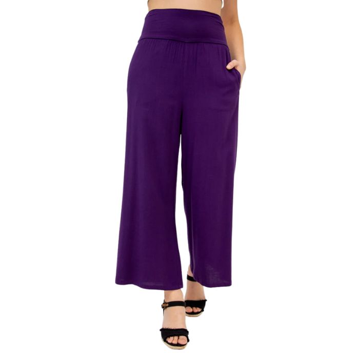 female model wearing royale purple landon capri pants front view on white background
