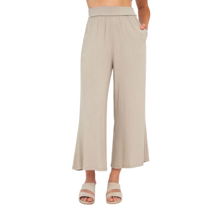 female model wearing sand brown landon capri pants front view on white background