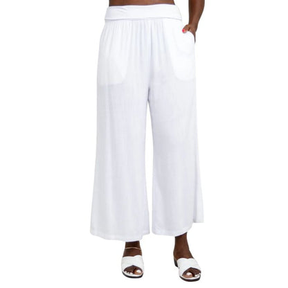 female model wearing white landon capri pants front view on white background