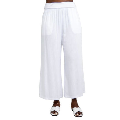female model wearing white landon capri pants front view on white background