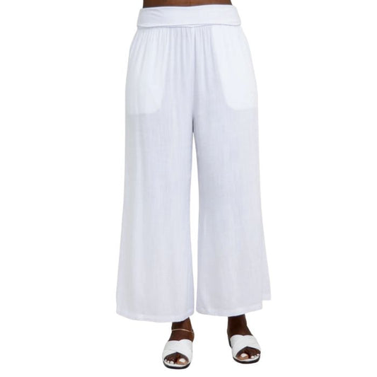 female model wearing white landon capri pants front view on white background