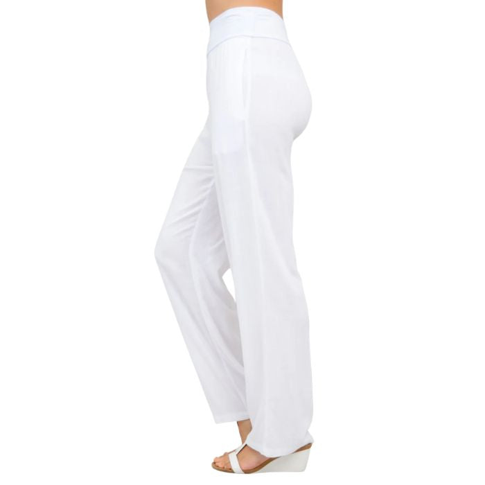 female model wearing white landon pants side view on white background