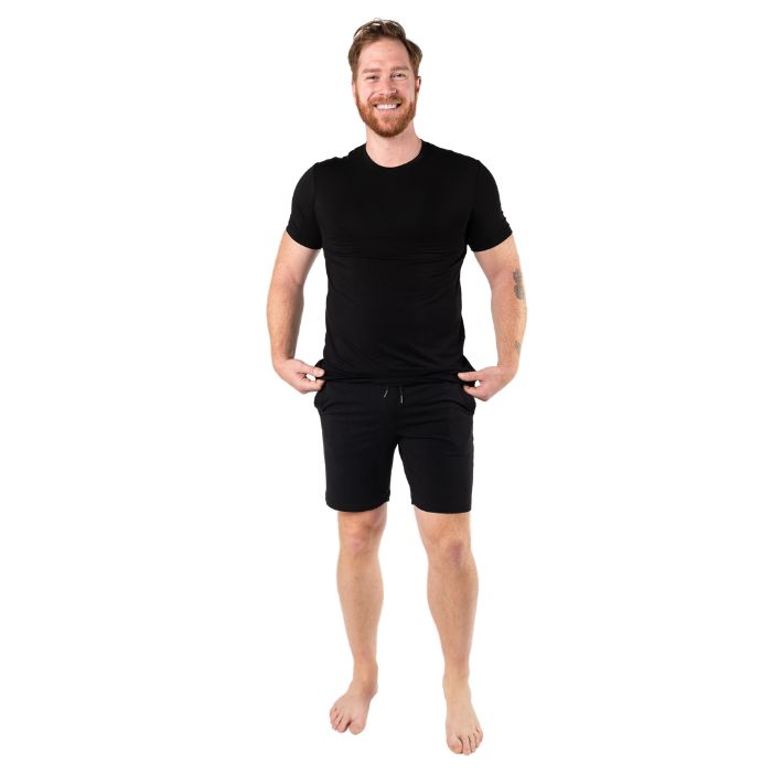 male model wearing black lawrence crew neck t-shirt and black aspen shorts ront view on white background
front view on white background