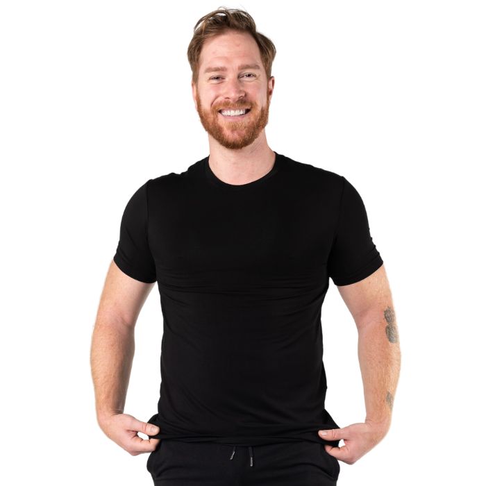 male model wearing black lawrence crew neck t-shirt front view on white background
