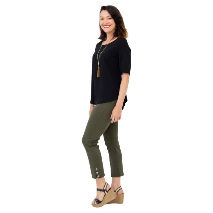 female model wearing black liza top and khaki green nadine cropped pants side  view on white background