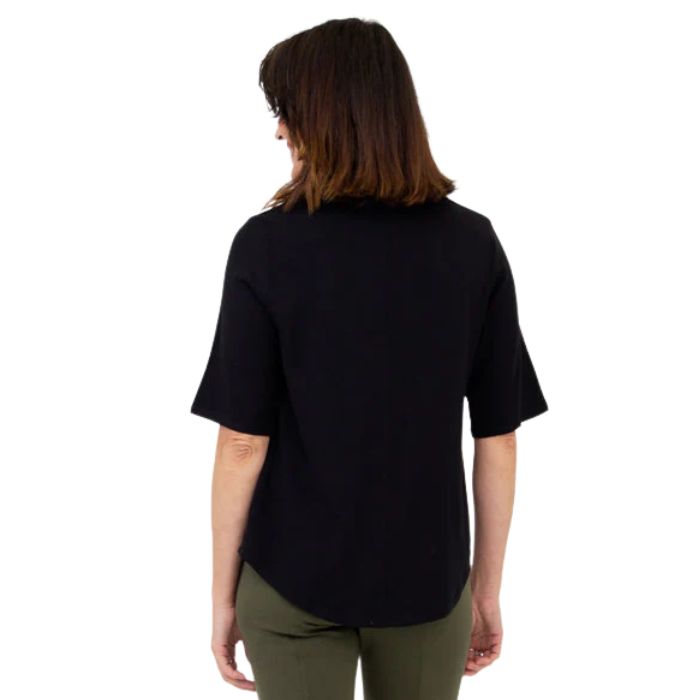 female model wearing black liza top back view on white background