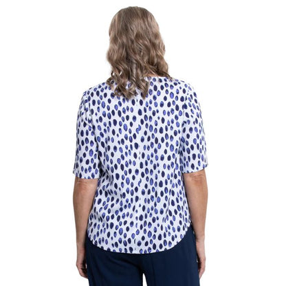 model wearing indigo rain liza top back view on white background