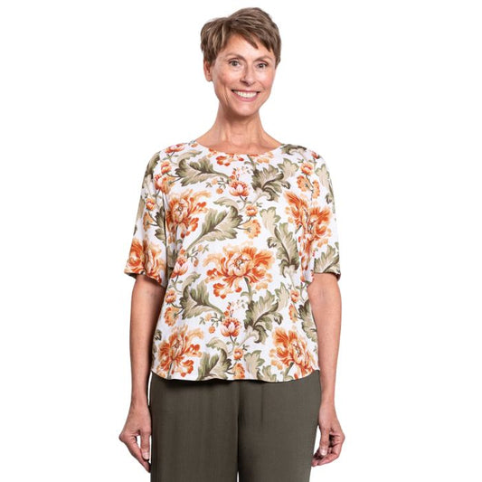 female model wearing khaki tapestry print liza top front view on white background