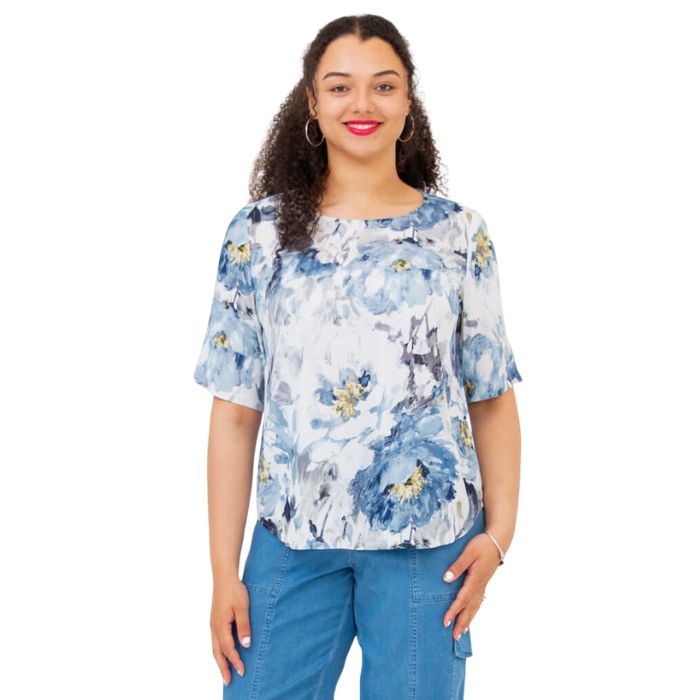 model wearing muse print liza top waist up front view on white background