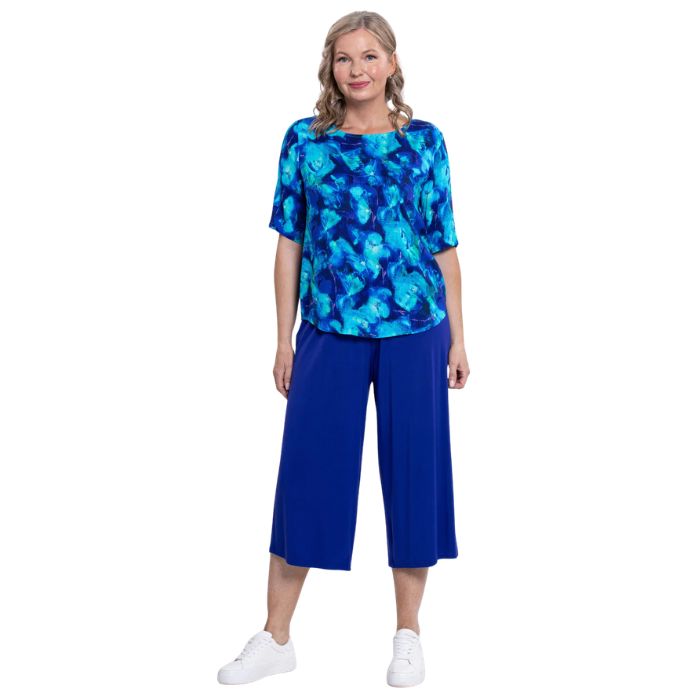 model wearing ocean reef liza top and violet gaylene capri pants front view on white background