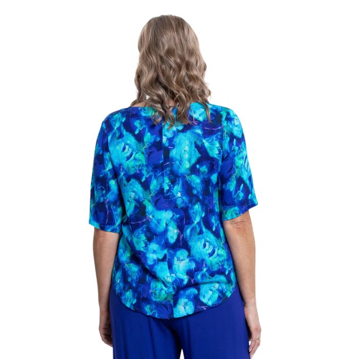 model wearing ocean reef liza top back view on white background