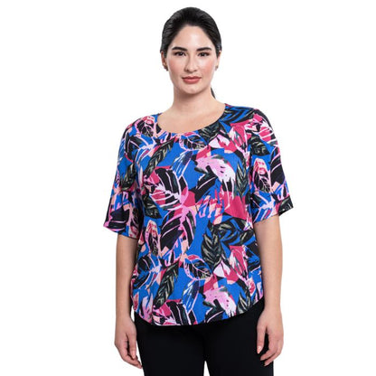 female model wearing pink bonita print liza top front view on white background
