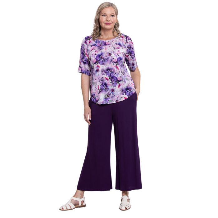 model wearing royale dynasty liza top and royale purple landon capri pants front view on white background