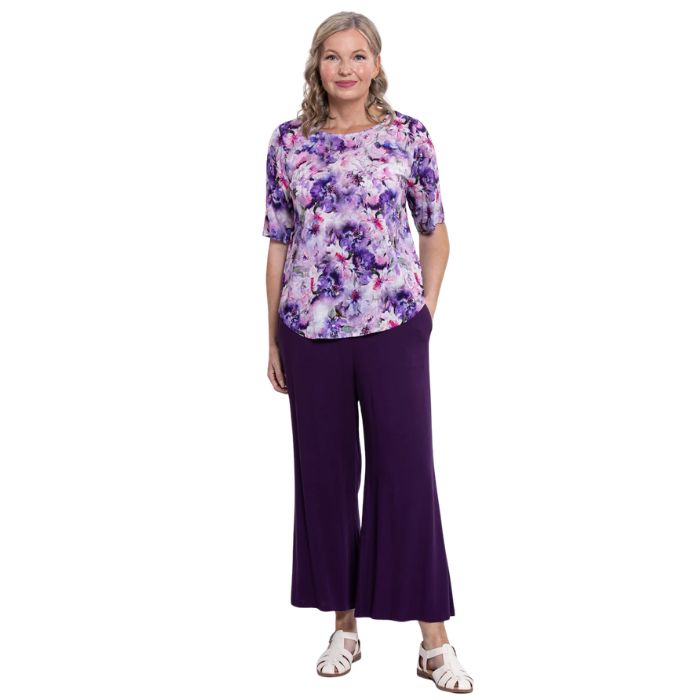 model wearing royale dynasty liza top and royale purple landon capri pants front view on white background
