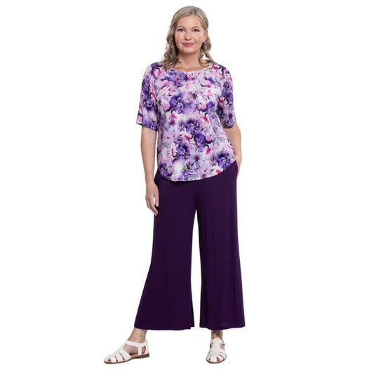 model wearing royale dynasty liza top and royale purple landon capri pants front view on white background