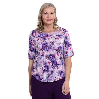 model wearing royale dynasty liza top front view on white background