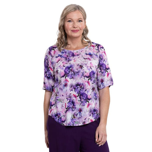 model wearing royale dynasty liza top front view on white background