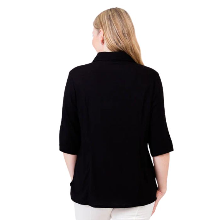 model weaing black lorine blouse back view on white background
