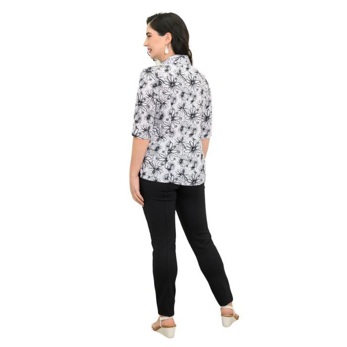 model wearing bw sketch print lorine blouse and black nadia pants back view on whitte background