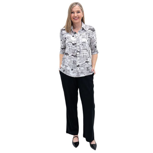 model weaing french news print lorine blouse and black gaylene pants front view on white background