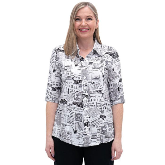 model weaing french news print lorine blouse front view on white background