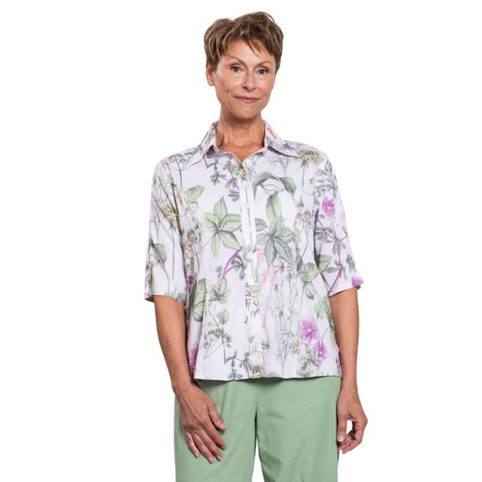 model wearing khaki clover print lorine blouse front view on whitte background