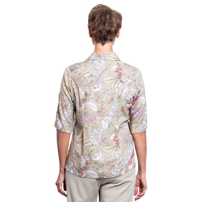 model wearing khaki primavera print lorine blouse back view on whitte background