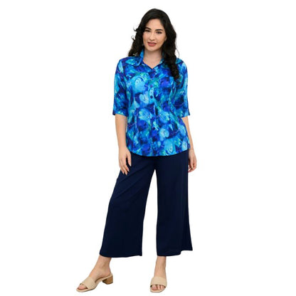 model wearing ocean reef print lorine blouse and indigo blue belle capri pants front view on white background
