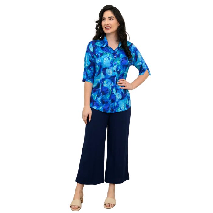 model wearing ocean reef print lorine blouse and indigo blue belle capri pants front view on white background