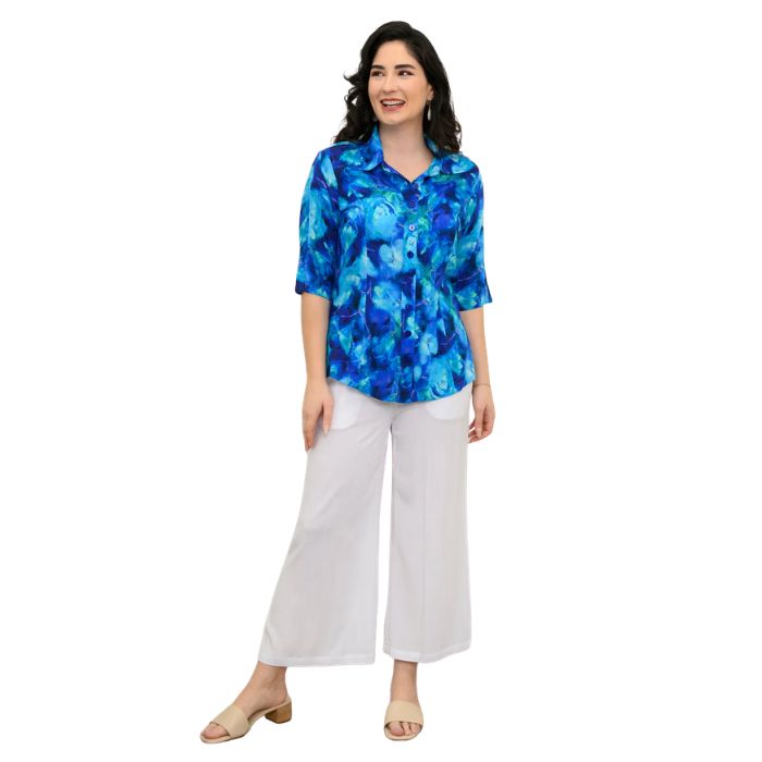 model wearing ocean reef print lorine blouse and white belle capri pants front view on white background