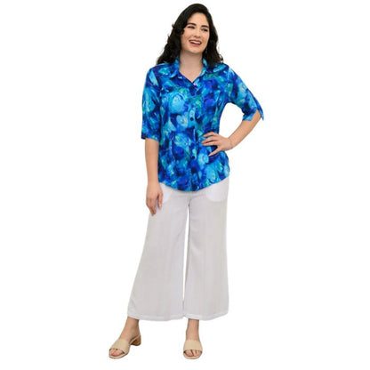 model wearing ocean reef print lorine blouse and white belle capri pants front view on white background