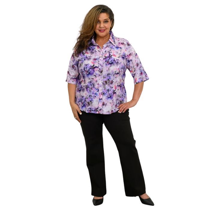 model wearing royale dynasty print lorine blouse and black daya pants  front view on whitte background
