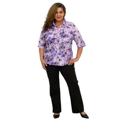 model wearing royale dynasty print lorine blouse and black daya pants  front view on whitte background