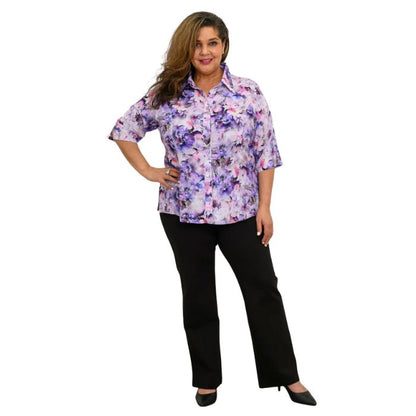 model wearing royale dynasty print lorine blouse and black daya pants  front view on whitte background