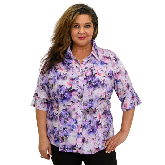 model wearing royale dynasty print lorine blouse front view on whitte background