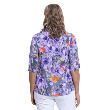 model wearing violet bloom print lorine blouse back view on whitte background