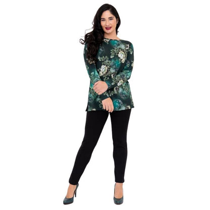 female model wearing teal miagic print margie top and black riley leggings front view on white background