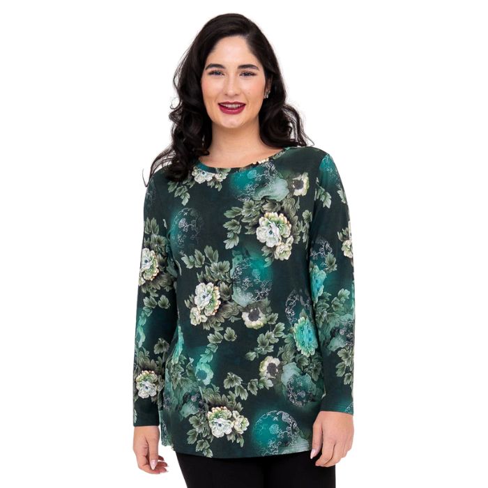 top half of female model wearing teal magic print margie tunic top front view on white background
