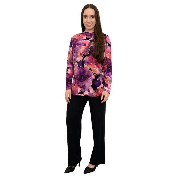 a woman wearing royale garden print margie top and black daya pants front view set on a studio white background