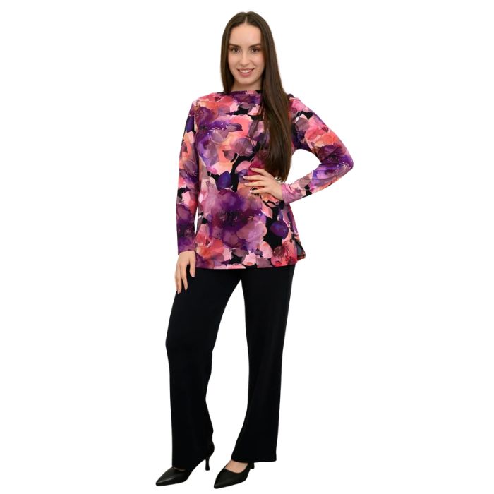 a woman wearing royale garden print margie top and black daya pants front view set on a studio white background