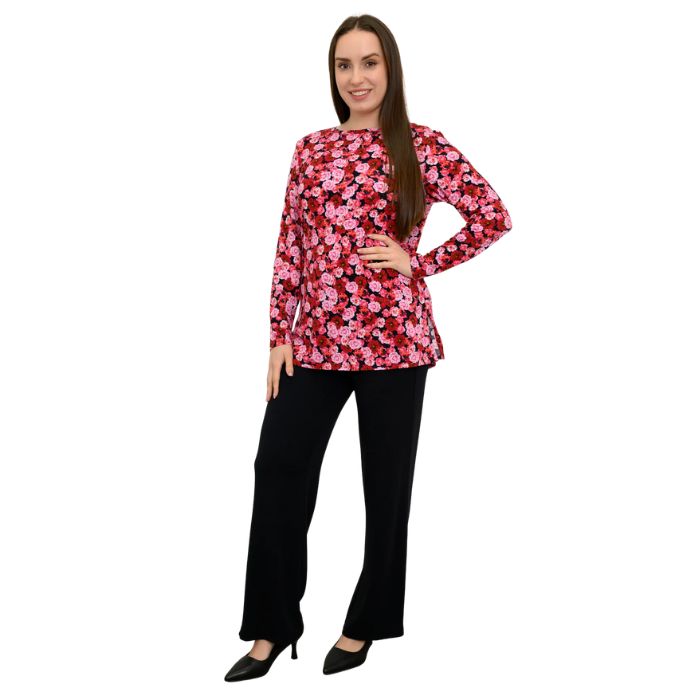 a woman wearing vermillion rose print margie top and black daya pants front view set on a studio white background